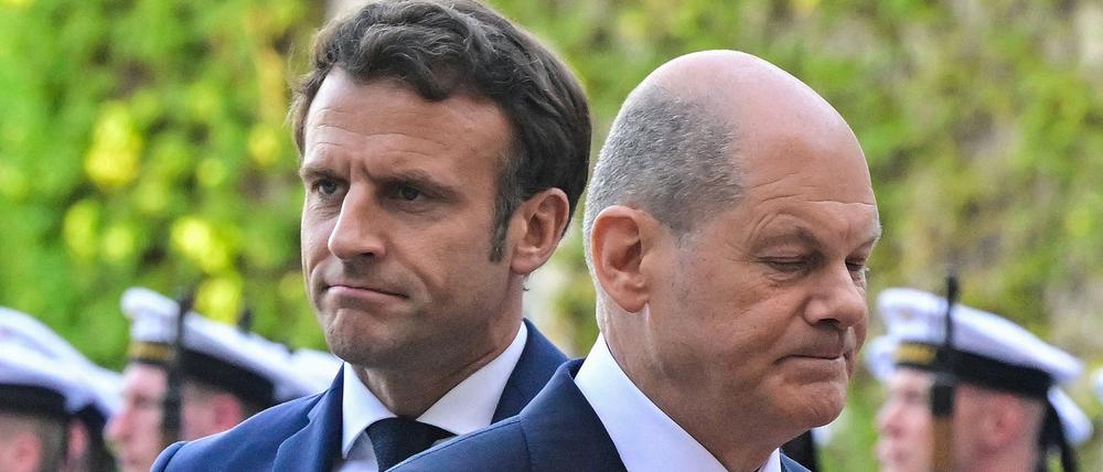 Über Kreuz. Frankreichs Staatschef Macron (links) und Kanzler Scholz haben beim Verbrenner-Aus und der Kernkraft unterschiedliche Ansichten.