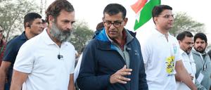 Rahul Gandhi, leader of India's main opposition Congress party, and former India central bank chief Raghuram Rajan attend Bharat Jodo Yatra, or Connect India March, in the northwestern state of Rajasthan, India, December 14, 2022. All India Congress Committee/Handout via REUTERS THIS IMAGE HAS BEEN SUPPLIED BY A THIRD PARTY. NO RESALES. NO ARCHIVES. EDITORIAL PURPOSES ONLY.