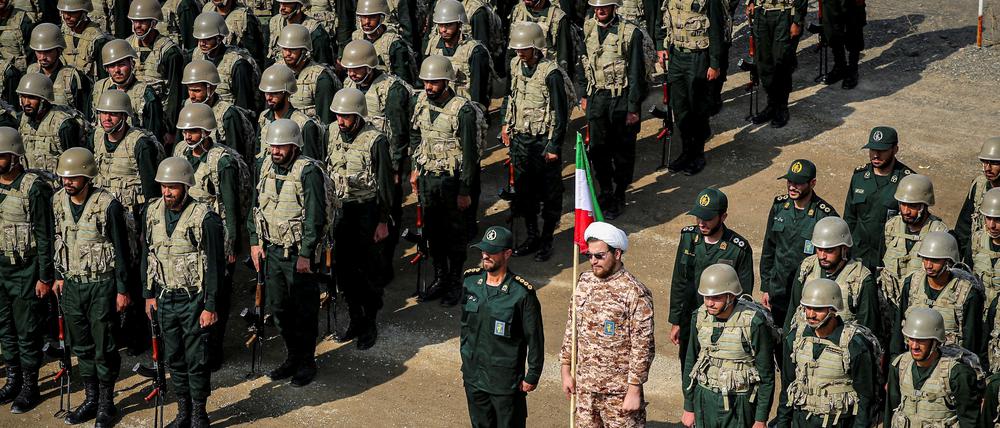FILE PHOTO: Members of the Islamic Revolutionary Guard Corps (IRGC) attend an IRGC ground forces military drill in the Aras area, East Azerbaijan province, Iran, October 17, 2022. IRGC/WANA (West Asia News Agency)/Handout via REUTERS/File Photo