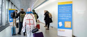 Reisende am Flughafen in China.