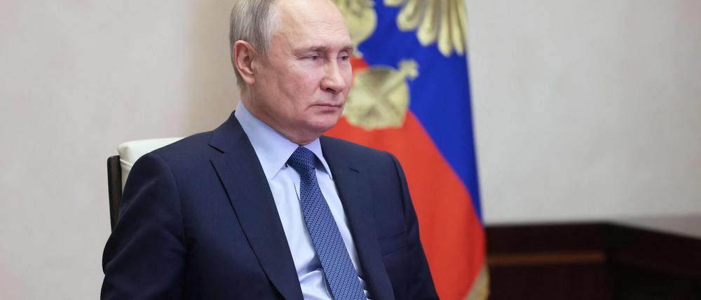 Russian President Vladimir Putin chairs a Security Council meeting via a video link at the Novo-Ogaryovo state residence, outside Moscow, on February 13, 2023. (Photo by Mikhail Metzel / SPUTNIK / AFP)