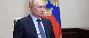 Russian President Vladimir Putin chairs a Security Council meeting via a video link at the Novo-Ogaryovo state residence, outside Moscow, on February 13, 2023. (Photo by Mikhail Metzel / SPUTNIK / AFP)