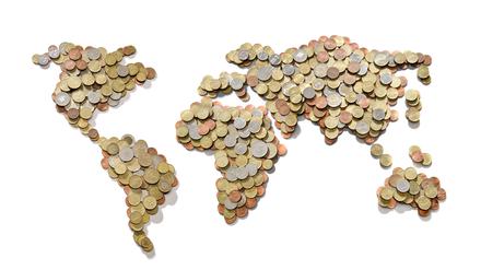Global money map. World map made of money coins isolated on white background