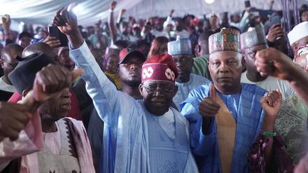 230301 -- ABUJA, March 1, 2023 -- President-elect Bola Tinubu C, Front celebrates with his supporters after his victory in Nigeria s presidential election in Abuja, capital of Nigeria, March 1, 2023. Bola Tinubu from Nigeria s ruling All Progressives Congress party has won Nigeria s presidential election with over 8.79 million ballots, the country s electoral body said Wednesday. Photo by /Xinhua NIGERIA-NEW PRESIDENT-BOLA TINUBU EmmaxOsodi PUBLICATIONxNOTxINxCHN