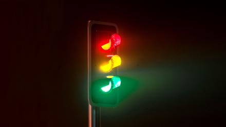 Traffic light on foggy night