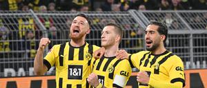 Die Nationalspieler Emre Can (rechts) und Marco Reus (Mitte) erzielten gegen Leipzig die Tore.