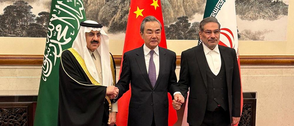 Saudi Minister of State and National Security Adviser Musaed bin Mohammed Al-Aiban, meets the Iranian Rear Admiral Ali Shamkhani, the secretary of the Supreme National Security Council, and China's Director of the Office of the Central Foreign Affairs Commission Wang Yi, in Beijing, China, March 10, 2023. Saudi Press Agency/Handout via REUTERS THIS IMAGE HAS BEEN SUPPLIED BY A THIRD PARTY