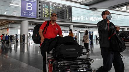 Künftig werden am Flughafen von Peking wieder mehr ausländische Touristen zu sehen sein. 