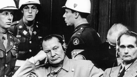 GERMANY. Reichsmarschall Hermann Göring C, and Hitler s deputy leader Rudolf Hess R during their trial in Nuremburg, 1945. PUBLICATIONxINxGERxAUTxONLY TASS_435162