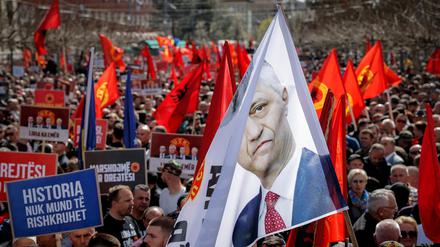 People attend a "March for Justice" in support of former Kosovo President Hashim Thaci, who is considered a hero by compatriots for leading the 1998-99 insurgency against Serbian rule that led to independence, ahead of his trial for alleged war crimes during the conflict, in Pristina, Kosovo, April 2, 2023. REUTERS/Valdrin Xhemaj NO RESALES. NO ARCHIVES
