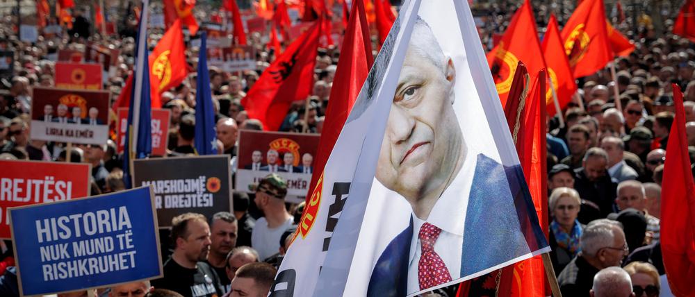 People attend a "March for Justice" in support of former Kosovo President Hashim Thaci, who is considered a hero by compatriots for leading the 1998-99 insurgency against Serbian rule that led to independence, ahead of his trial for alleged war crimes during the conflict, in Pristina, Kosovo, April 2, 2023. REUTERS/Valdrin Xhemaj NO RESALES. NO ARCHIVES