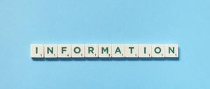 Information formed of scrabble blocks on blue background. Information word formed of scrabble blocks on blue background. Creative template with copy space. Copyright: xZoonar.com/IaroslavxDanylchenkox 18811459