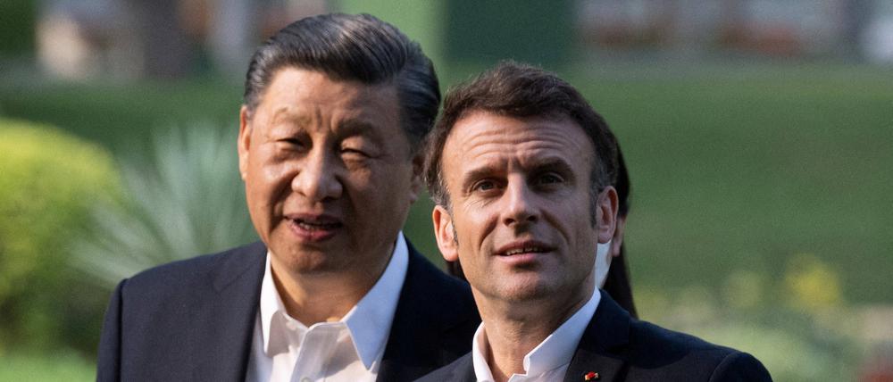 Chinas Präsident Xi Jingping (r.) und Frankreichs Präsident Emmanuel Macron bei einem gemeinsamen Treffen in China.