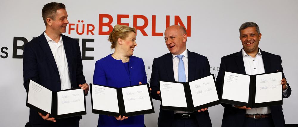 Secretary General of the Christian Democratic Union party (CDU) Stefan Evers, Outgoing Governing Mayor of Berlin and leader of Berlin's Social Democratic Party (SPD) Franziska Giffey, Governing Mayor of Berlin designate and leader of Berlin's CDU Kai Wegner and Chairman of the SPD Berlin Raed Saleh attend an event to sign the coalition treaty in Berlin, Germany, April 26, 2023. REUTERS/Christian Mang