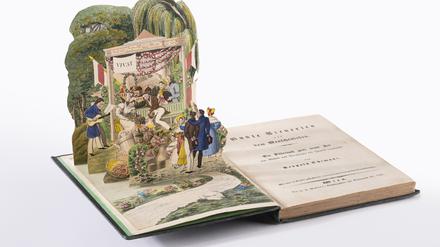 Leopold Chimanis Erzählband „Bunte Scenieren aus dem Menschenleben“ von 1836, das als erstes Pop-up-Buch der Literaturgeschichte gilt. Zu sehen im Stabi Kulturwerk. C:  Staatsbibliothek zu Berlin - PK 2023 