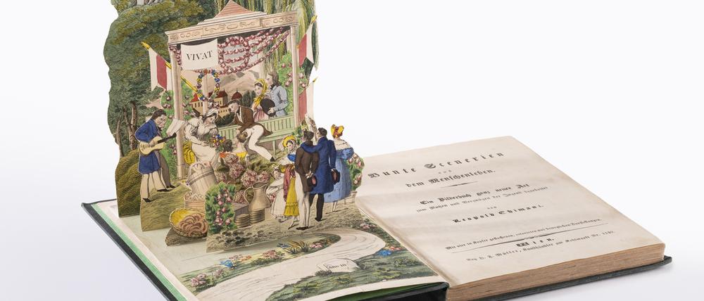 Leopold Chimanis Erzählband „Bunte Scenieren aus dem Menschenleben“ von 1836, das als erstes Pop-up-Buch der Literaturgeschichte gilt. Zu sehen im Stabi Kulturwerk. C:  Staatsbibliothek zu Berlin - PK 2023 