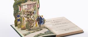 Leopold Chimanis Erzählband „Bunte Scenieren aus dem Menschenleben“ von 1836, das als erstes Pop-up-Buch der Literaturgeschichte gilt. Zu sehen im Stabi Kulturwerk. C:  Staatsbibliothek zu Berlin - PK 2023 
