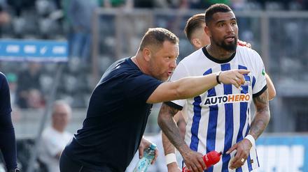 Kevin-Prince Boateng hat Adduktorenprobleme. Er muss laut Trainer Dardai (l.) sieben, acht Tage pausieren.