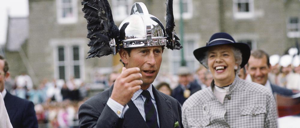 SHETLAND ISLES, SCOTLAND - JULY 24: Prince Charles Trying On A Viking Helmet During A Visit To The Shetland Isles, Scotland. (Photo by Tim Graham Photo Library via Getty Images)