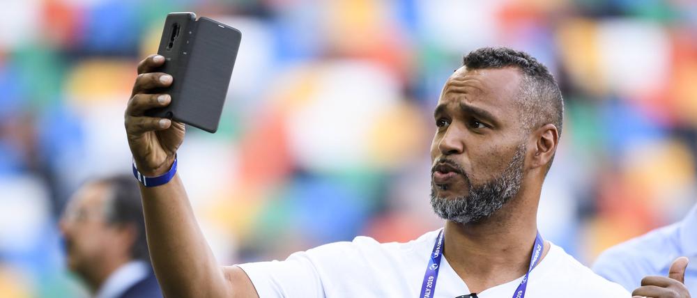 Patrick Esume, 46, ist eines der bekanntesten Gesichter des American Footballs in Deutschland.