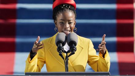 American poet Amanda Gorman reads a poem after Joe Biden is sworn in as the 46th president of the United States at the U.S. Capitol at the 59th Presidential Inauguration on Wednesday, January 20, 2021 in Washington.