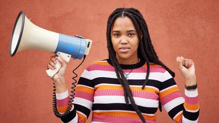 Protest, megaphone and portrait of a woman by a wall in the city for freedom, equality and human rights. Fist, speaker and African female fighting at a rally for justice, democracy and racism in town Protest, megaphone and portrait of a woman by a wall in the city for freedom, equality and human rights. Fist, speaker and African female fighting at a rally for justice, democracy and racism in town. ,model released, Symbolfoto Copyright: xZoonar.com/YurixArcursxpeopleimages.comx 19837505 ,model released, Symbolfoto ,property released