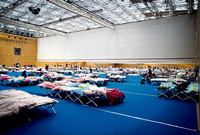 Zahlreiche Turnhallen wie hier am Olympiapark in Charlottenburg wurde in den vergangenen Monaten zu Notunterkünften für Flüchtlinge umfunktioniert.