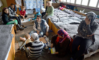 Eine syrische Flnchtlingsfamilie in einem Camp im bulgarischen Vrazdebna - fotografiert an dem Tag, an dem der UN-Flüchtlingskommissar Antonio Guterres das Lager besuchte.