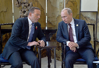 Der russische Präsident Wladimir Putin (rechts) mit dem australischen Premierminister Tony Abbott am Rande des Apec-Gipfels in Peking.