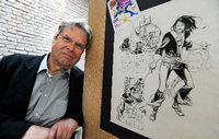 Peter Wiechmann next to the ink drawing of a comic from the series "Capitan Terror", appeared in the series "Primo".