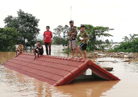 Ein überschwemmtes Gebiet nach dem Bruch eines Staudamms in Laos.