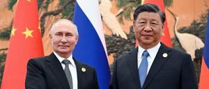 Zwei von einem Schlag: Russlands Präsident Wladimir Putin mit Chinas Staats- und Parteichef Xi Jinping bei einem Treffen im Oktober. 