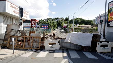 A roadblock is pictured during French President Emmanuel Macron’s visit in Noumea, France’s Pacific territory of New Caledonia on May 23, 2024. 