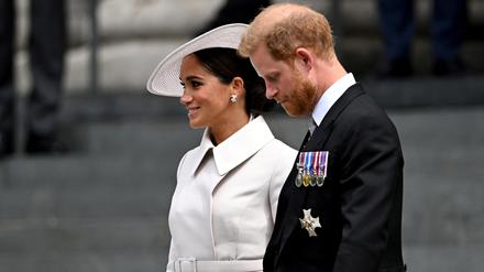 FILE PHOTO: Britain's Prince Harry and his wife Meghan, Duchess of Sussex, leave after the National Service of Thanksgiving held at St Paul's Cathedral as part of celebrations marking the Platinum Jubilee of Britain's Queen Elizabeth, in London, Britain, June 3, 2022. REUTERS/Dylan Martinez/File Photo