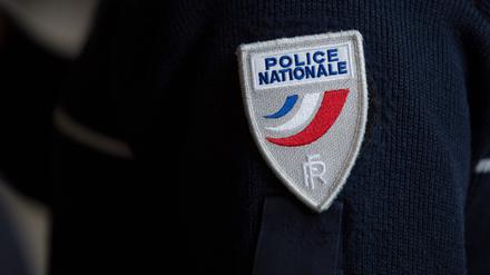 (FILES) A French police (Police Nationale) badge is pictured during the presentation of the French police (Police Nationale) new recruitment campaign, on May 4, 2016 in Paris. A 14-year-old teenager was stabbed to death on the platform of the Saint-Denis metro in the on January 17, 2024, during a brawl between several people, according to the Bobigny public prosecutor's office and police sources. The incident took place in the early evening at Basilique de Saint-Denis station on line 13 of the Paris metro, according to the same sources. The young man was seriously injured before dying, despite receiving heart massage from the fire brigade. (Photo by Geoffroy Van der Hasselt / AFP)