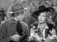 Ich schau dir in die Augen, Kleiner. Marlene Dietrich becirct James Stewart in "Destry Rides Again". (Berlinale Classics)
