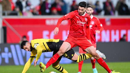 Heidenheims Tim Kleindienst (re.) hatte den Siegtreffer gegen Borussia Dortmund auf dem Fuß und vergab.