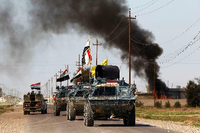 Vormarsch irakischer Truppen nahe der Stadt Al Alam auf die IS-Hochburg Tikrit. Seit Beginn der Offensive am 1. März haben die irakischen Kräfte die wichtige Stadt entlang der Straße von Bagdad nach Mossul schrittweise eingeschlossen.
