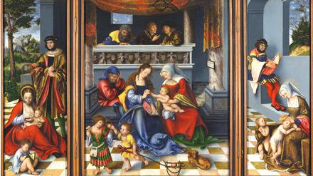 Jesus und seine Verwandtschaft. Im Vordergrund die Frauen mit ihren lebhaften Kindern, die Männer üben sich in Zurückhaltung. Die „Heilige Sippe“ auf dem Torgauer Altar von Lucas Cranach d.Ä., 1509. 