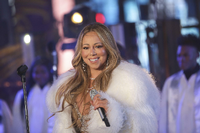 Mal wieder die Nummer Eins. Die US-Sängerin Mariah Carey, hier 2017 bei einem Silvesterauftritt auf dem Times Square in New York.