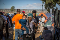 Migranten an der mexikanischen Grenze zu den USA. Die UN will die weltweite Migration neu regeln. Foto: Omar Martinez/dpa