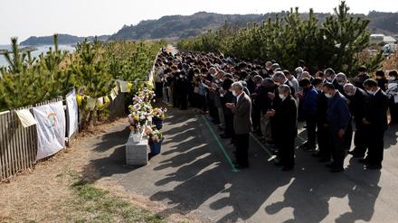 Japaner gedenken der Opfer des 11. März 2011.