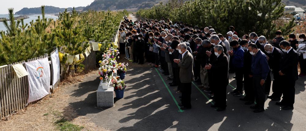 Japaner gedenken der Opfer des 11. März 2011.