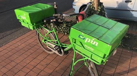 Die grünen Zustell-Fahrräder der PIN AG.