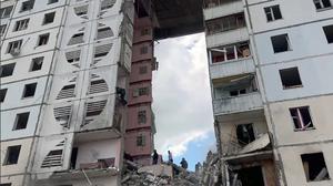 This handout photograph released on May 12, 2024, on the official Telegram account of the Belgorod region governor Vyacheslav Gladkov, shows a view of an apartment building which partially collapsed after being damaged by a Ukrainian strike in Belgorod. 