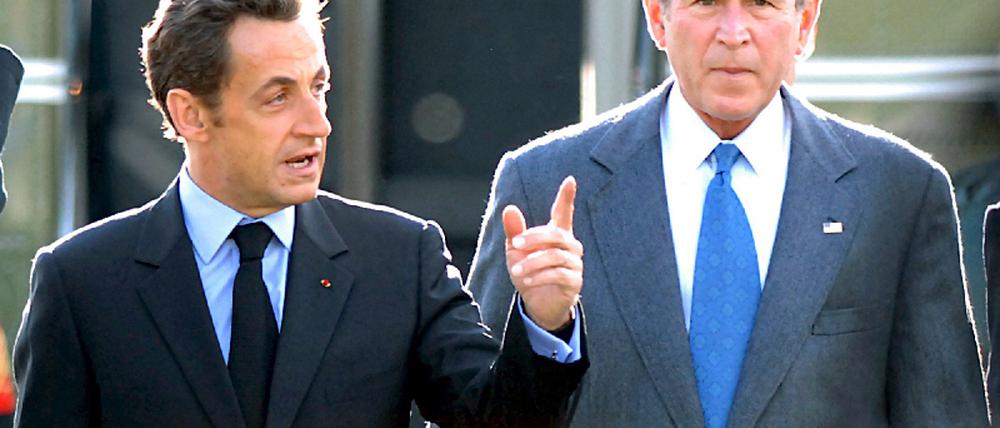 Sarkozy und Bush