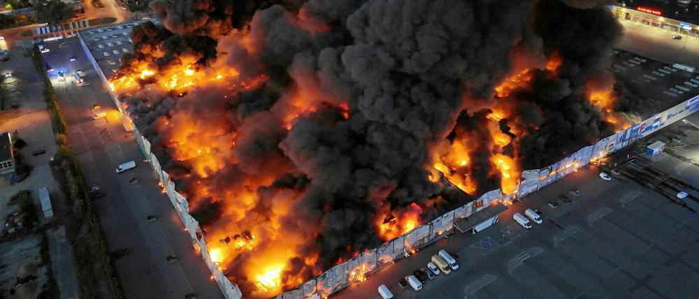 Drone view of the Marywilska 44 shopping centre burning during a massive fire in Warsaw, Poland.