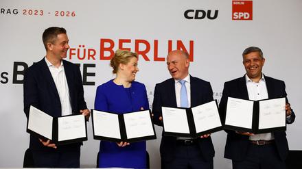 Secretary General of the Christian Democratic Union party (CDU) Stefan Evers, Outgoing Governing Mayor of Berlin and leader of Berlin's Social Democratic Party (SPD) Franziska Giffey, Governing Mayor of Berlin designate and leader of Berlin's CDU Kai Wegner and Chairman of the SPD Berlin Raed Saleh attend an event to sign the coalition treaty in Berlin, Germany, April 26, 2023. REUTERS/Christian Mang