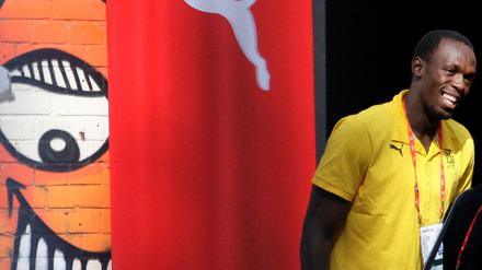 Sprinter Bolt of Jamaica arrives for news conference in Berlin