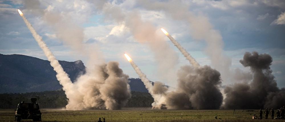 TOPSHOT - A missile is launched from a United States military HIMARS system during joint military drills at a firing range in northern Australia as part of Exercise Talisman Sabre, the largest combined training activity between the Australian Defence Force and the United States military, in Shoalwater Bay on July 22, 2023. (Photo by ANDREW LEESON / AFP)